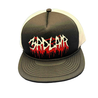 Trucker hat with a logo on a gray surface