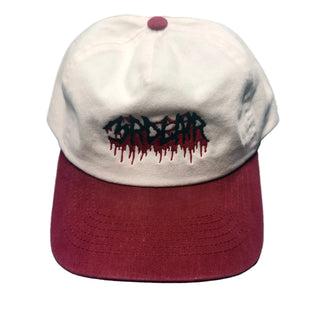 Cap with a graphic design on a textured surface