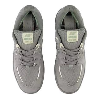Pair of gray sneakers on a white background